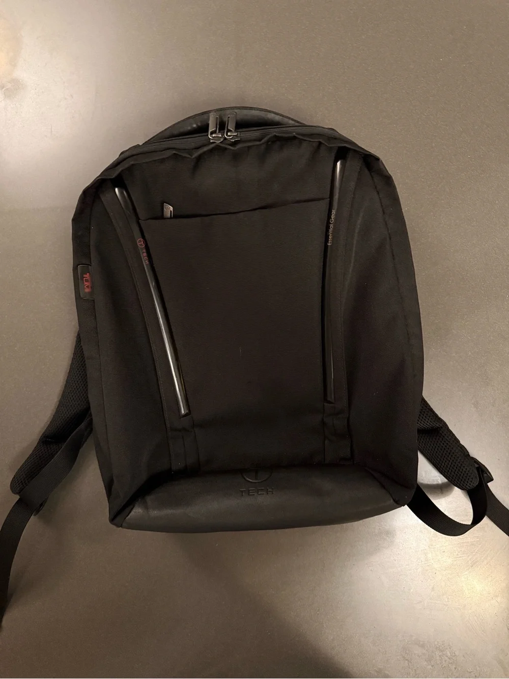 Tumi Black Tech Backpack with Subtle Red Accent